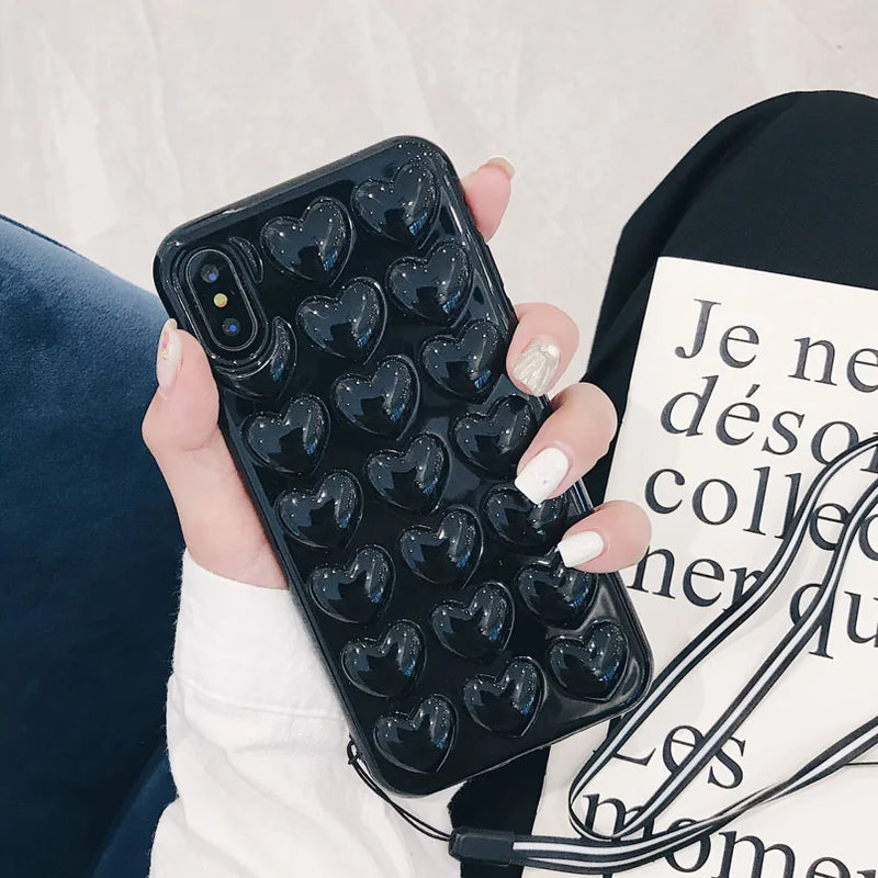 Trendy black 3D heart bubble phone case – cute and protective design.