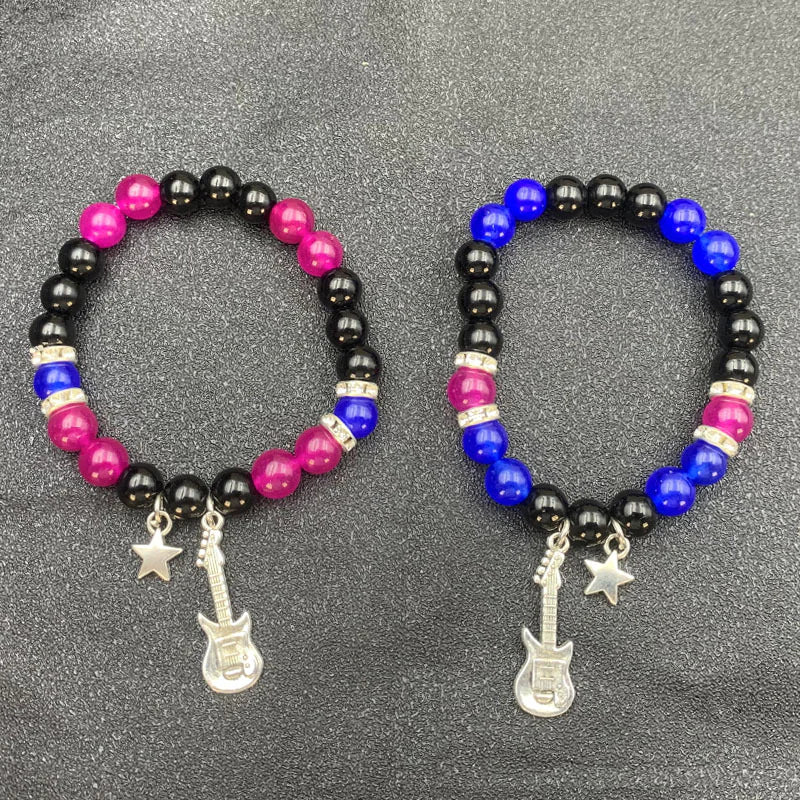 Matching charm bracelets for couples – cool and cute rock music jewelry.